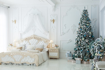 New Year's interior in a beautiful bright bedroom.