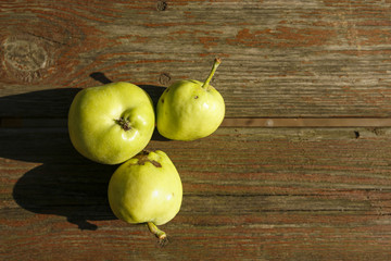 organic apples on wooden table