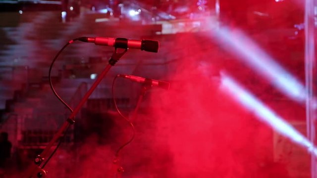 Beautiful light, smoke and microphones on stage