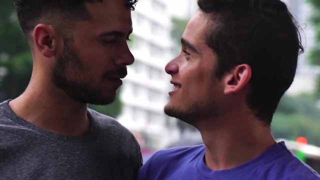 Gay Couple Looking Each Other - Romantic Scene in Avenue Paulista, Sao Paulo, Brazil