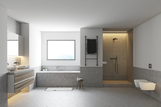 White bathroom interior, gray tub, sinks