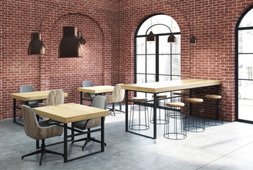 Brick cafe corner, wooden tables