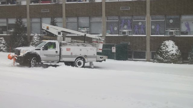 Utility Truck on standby during a Blizzard
