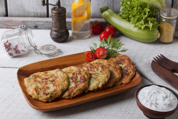 pancakes zucchini fritters vegetarian dish yogurt sauce