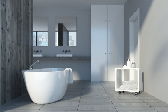 Gray and wooden bathroom interior, tub