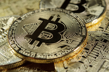 Fototapeta na wymiar Stack of bitcoins. New virtual money in golden color