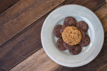 cookies in a plate on a wooden table