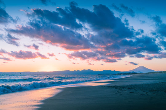 Mountain Fuji and sea wave in sunset at Shonan Coast,Kanagawa prefecture,Japan