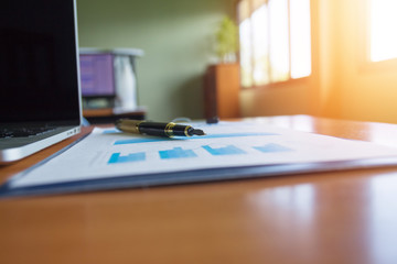 Pen,keyboard,calculator,report graph chart on office table,for Business.