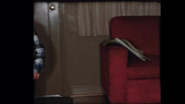 1957 Cute 5 year old blond boy plays majorette tosses batton