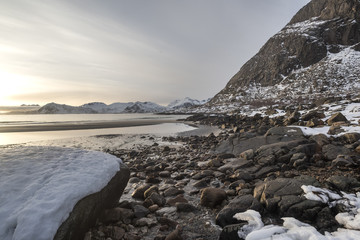 Rocks on beach during sunset, Lofoten, Nordland, Norway
