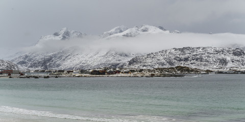 Sea with mountain range in the background, Lofoten, Nordland, Norway