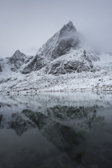 Fototapeta na wymiar Reflection of mountain in water, Lofoten, Nordland, Norway