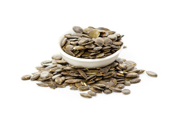 Pumpkin seeds isolated on white background