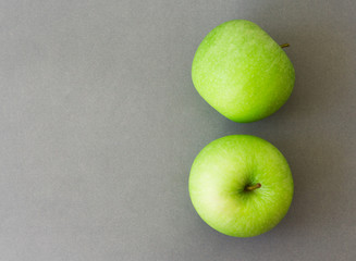 Closeup tov view green fresh apples fruit on grey background , healthy diet food concept