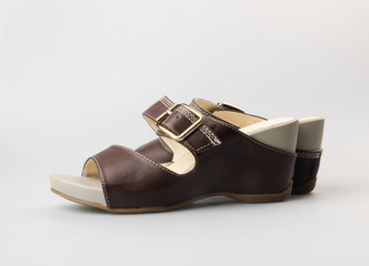 Naklejka premium shoe or female fashion sandal on background.