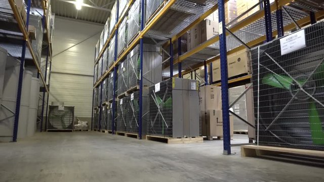 Warehouse logistic or distribution center. Interior of warehouse with ventilation systems. Distribution or delivery warehouse, logistics warehouse dispatch of goods