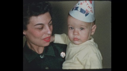 1953 50's Mom lights baby boys 1st birthday cake