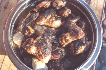 Grilled chicken kebab in a pot