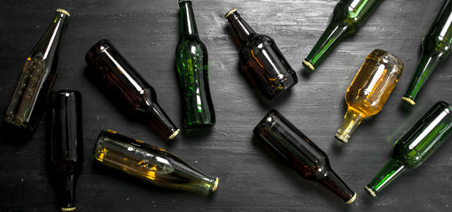 Bottles with fresh beer.