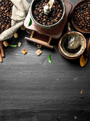 Coffee background. Fresh coffee with sugar crystals and coffee beans.