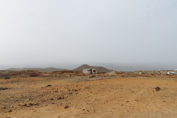 Caravan camping in remote desert country in haze