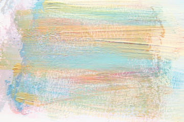 Colorful watercolor brush stroke over white background.