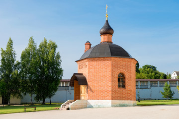 Fototapeta na wymiar Chapel with baptistery in the name of the great martyr George the Victorious in the Staritsky Svyato-Uspenskiy Monastery in the city Staritsa, Tver region