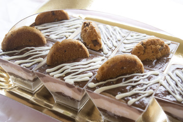 miniature pastry with melted chocolate and cream