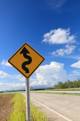 Traffic signs stand out, the sky is a beautiful background.