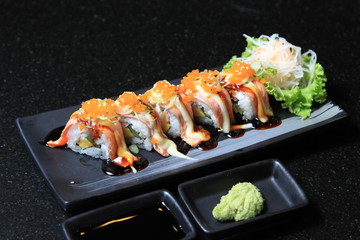 Salmon Sushi Roll Neatly SlicedSalmon Sushi Roll Neatly Sliced