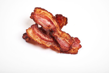 crispy fried bacon isolated on a white background.