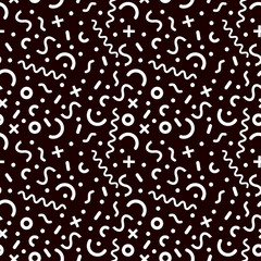 Memphis style seamless pattern on black background