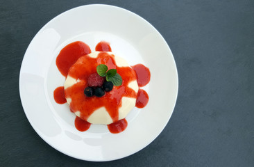 Panna cotta with sauce of red fruits