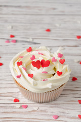 Cupcake decorated with hearts