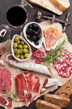 Salami, sausage, prosciutto and wine
