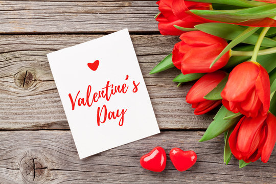 Red tulips and Valentine's day greeting card