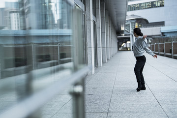 Fototapeta premium Woman dancing in the city