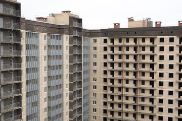 Fototapeta premium The building in which one half is built and the other half is not completed.