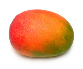 A whole mango closeup isolated on white background. Tropical, sweet and juicy fruit. Useful and sports nutrition. Health. Flat lay, top view