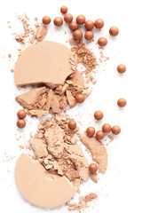 crushed nude cosmetic powder isolated on white