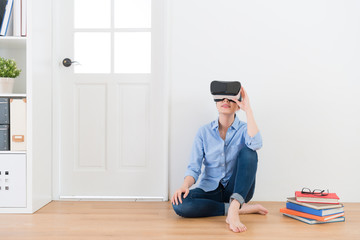 attractive woman using virtual reality goggles