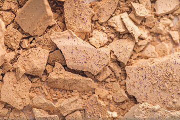 top view of crushed cosmetic powder as background