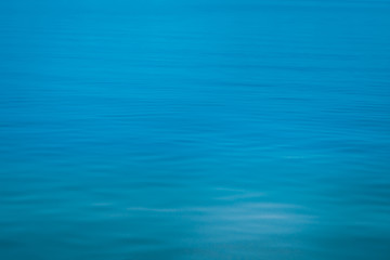Fototapeta na wymiar soft focus blue sea texture background