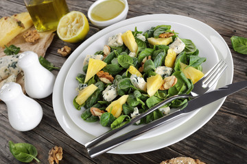 fresh spinach salad on a plate