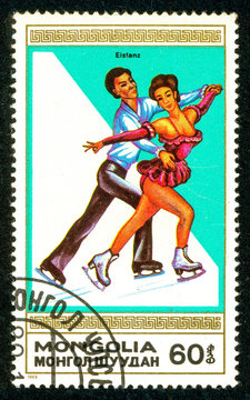 Ukraine - circa 2018: A postage stamp printed in Mongolia shows drawing Pairs figure skating. Series: Winter sports. Circa 1989.
