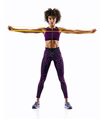 Sportswoman performs exercises for the muscles of the chest. Photo of young woman workout with resistance band isolated on white background. Strength and motivation.