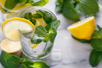 View from above on two glasses with reshness cold lemonade.