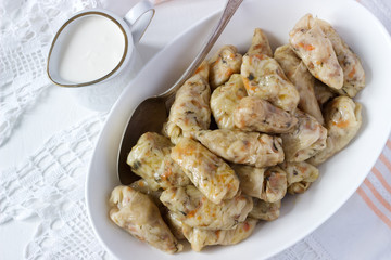 Cabbage rolls with meat, rice and vegetables. Dolma, sarma, sarmale, golubtsy or golabki.
