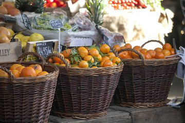 Oranges in wicker baskets for sale on the Borough market